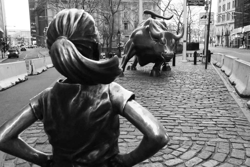 Close-up view of the famous bronze Charging Bull statue in lower Manhattan, symbolizing financial strength and resilience.